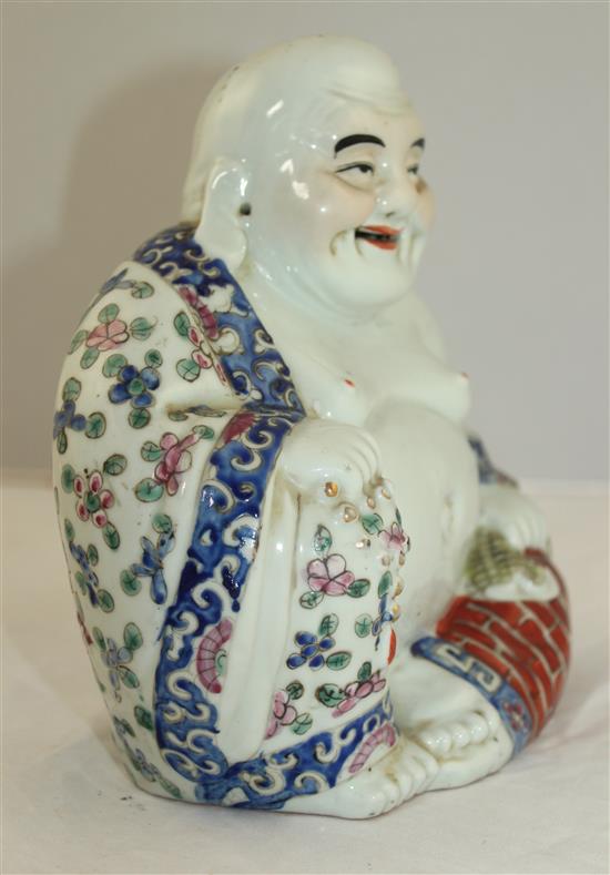 A Chinese famille rose seated figure Budai, Republic period, 20cm